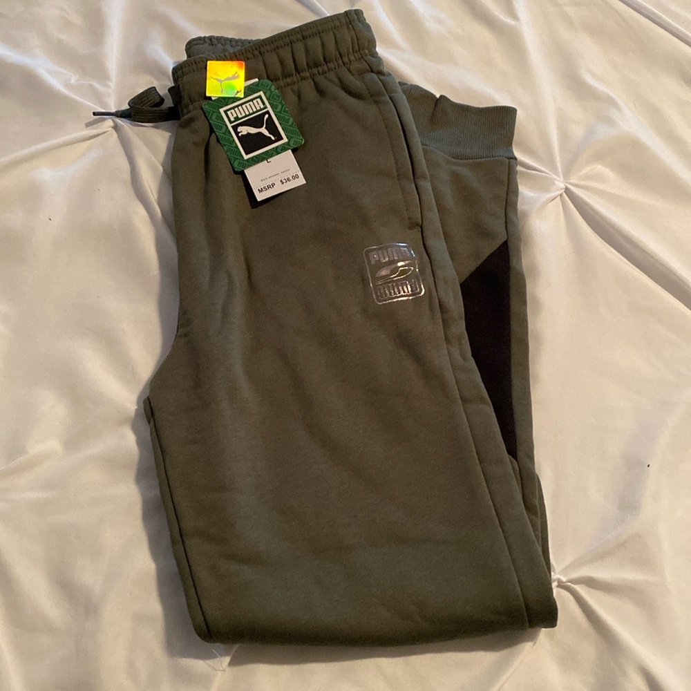 Boys large Puma joggers.